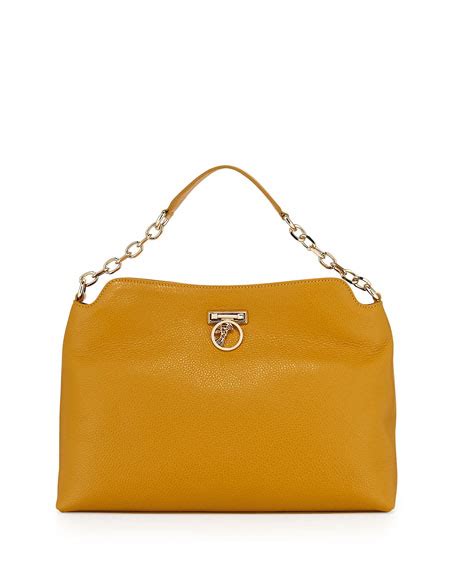 versace pebbled leather hobo bag yellow who sells this bag|Versace collection evening bag.